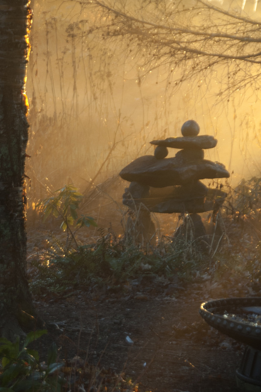 A Cairn cought on a misty golden morning.